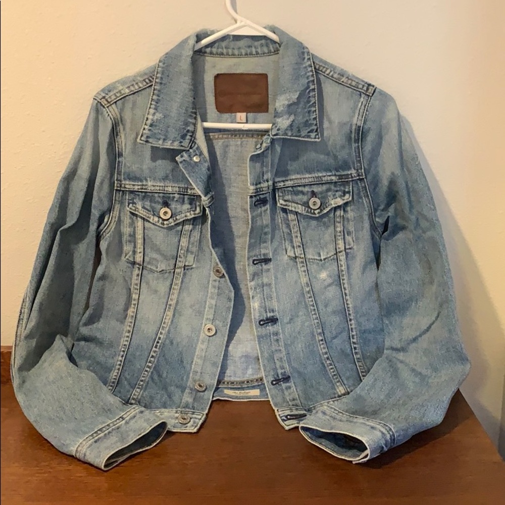 Distressed denim jacket by Adriano Goldschmied
